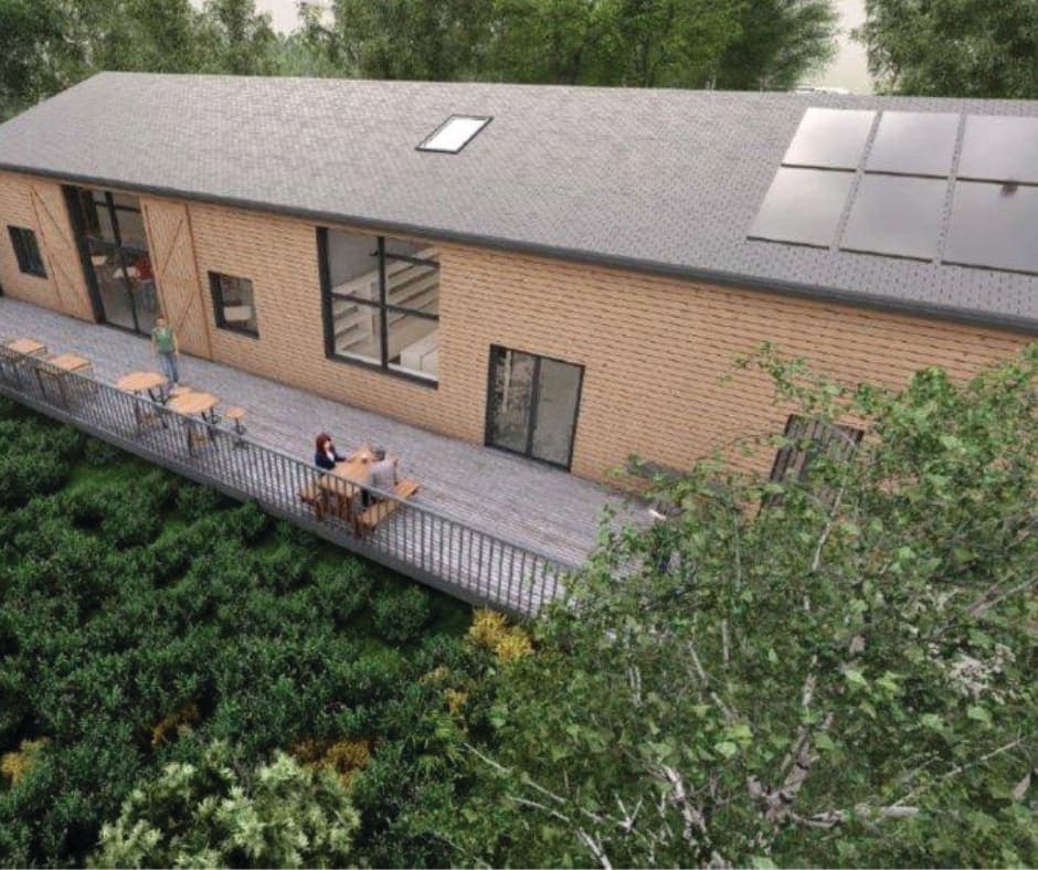 A house with a roof that has a solar panel on it